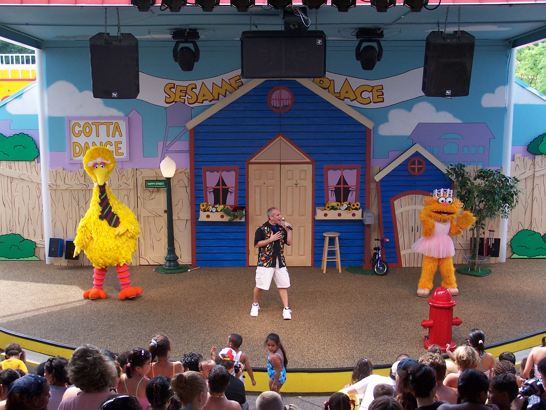 David Jack performing live on stage at Sesame Place with Big Bird and Zoey